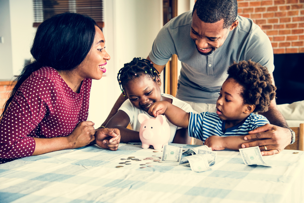 Happy family learning about handling money